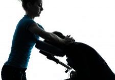 one man and woman performing chair massage in silhouette studio on white background